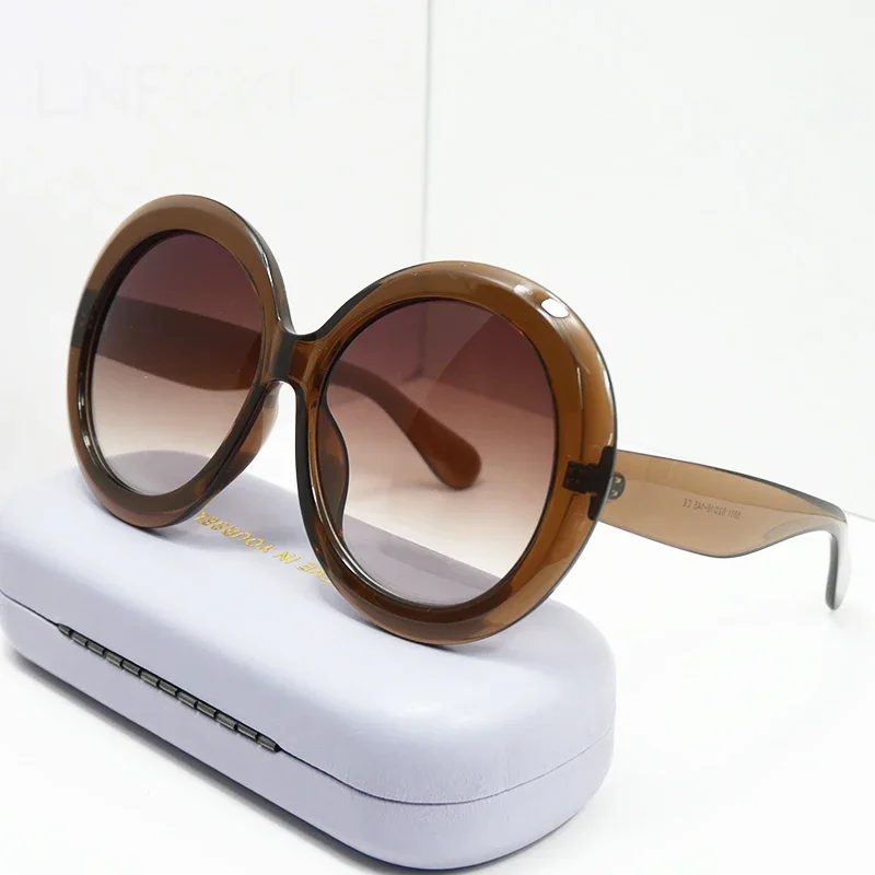 オーバーサイズのラウンド型サングラス。レディース、メンズ、高 - Designer Sunglasses のレビューと価格